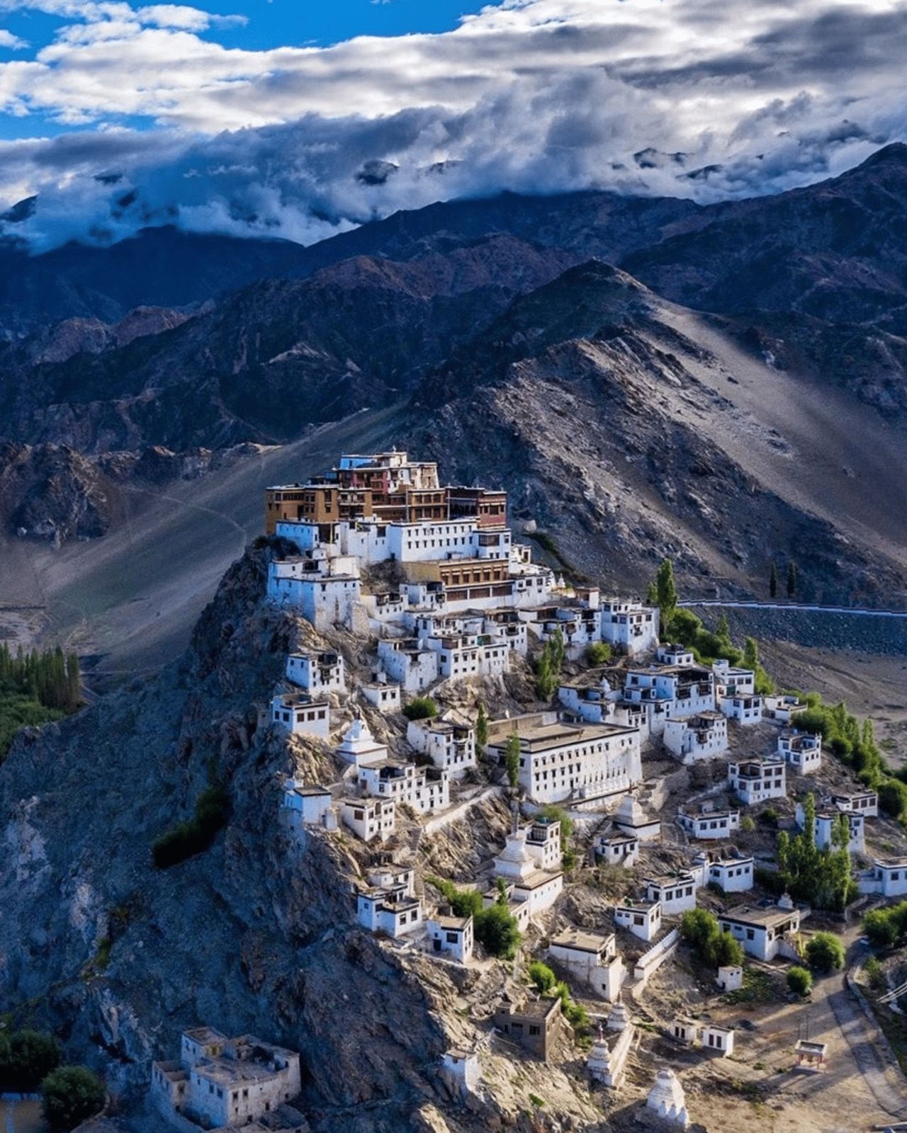 Layered mountain light over a Ladakh settlement, evoking the softer human scale of Nubra